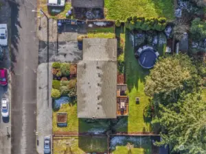 Beautifully landscaped with additional RV parking next to garage, and room for additional parking along the street, too.