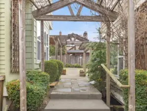 The central walkway has cascading arbors with climbing flowering vines. So lovely in the spring!