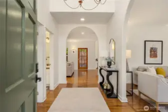 Upon entry enjoy the two story foyer and gorgeous arched doorways to the different spaces in the home.