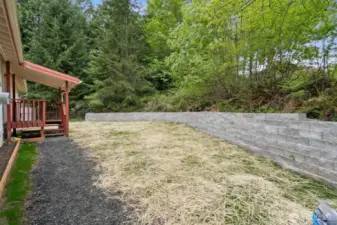 Brand new retaining wall, lawn and walkway