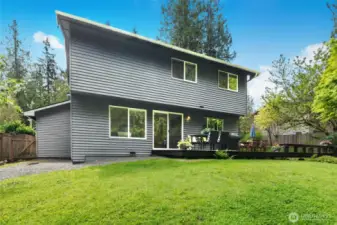 Lush, lawn area with stunning plantings.