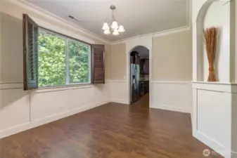 Dining room has beautiful arched wall niches