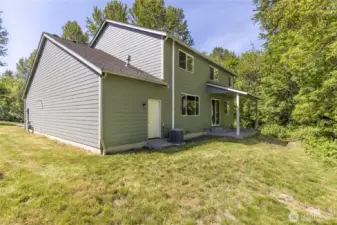 Third garage bay is a tandem, running the full depth of the house.
