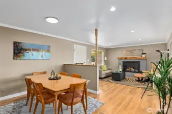 The open concept flor plan lives large, flowing from living to dining to kitchen and family rooms!