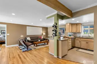 The light and bright family room and kitchen lead out to the deck.