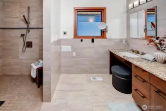 upstairs large shower with luxury finishes