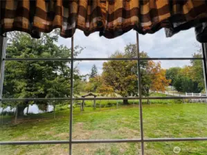 I would wash dishes everyday with this view. Pond, fruit tress, Bliss.