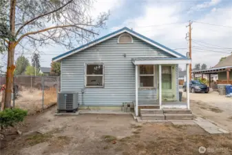 Back of home. New heat pump.