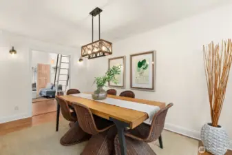 Beautiful classic dining room perfect for entertaining with french doors leading to the expansive front deck
