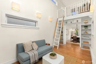 An added loft feature is a fun surprise to this fabulous room.  Access is via latter or upstairs