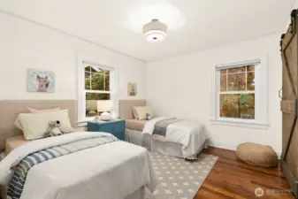 Second bedroom on the main floor.  Generously sized and easily sharable