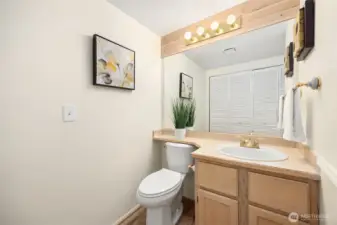 Downstairs powder room with brand new flooring!