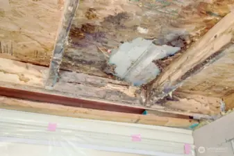 This is the damage to the enclosed deck's ceiling/roof