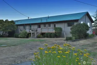 Main home entry on the left; apartment entry on the right.