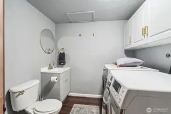 Laundry room with half bath.  Very convenient!