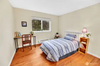 The second bedroom also has a South-facing window overlooking the beautiful natural greenbelt and more the the fresh paint and LVP flooring. All the windows have nice blinds also!
