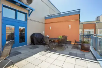 Community rooftop deck with BBQ