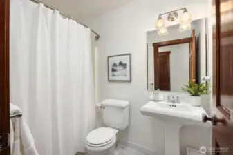The full bath serves the 2nd bedroom.