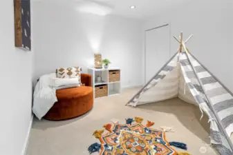 Second finished room off the rec room with a separate closet is a great space for play, a spot to read a book, or whatever else needed.