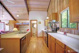 Full size kitchen ready to entertain with brand new dishwasher. Hardwood flooring. Ceiling fan recirculates heat downward making this heating truly efficient and cozy.