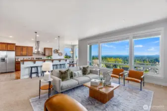 Walls of windows offer incredible views and fill the home with wonderful natural light.