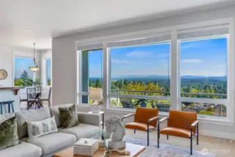 Walls of windows frrame ever-changing vistas and bathe the interior in light.