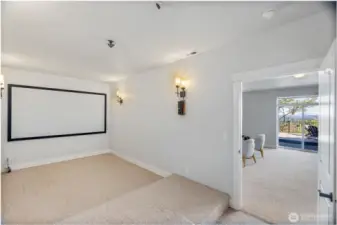 Host the best movie nights or watch game reels with the team in this amazing media room just off the rec room!