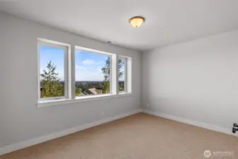 Bedroom #3 with great views and a large double door closet...  An additional bedroom (#4) is also on this level.