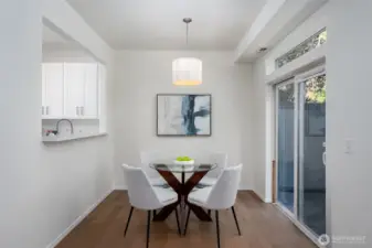 Dining room has a pleasant view of the patio and backyard.