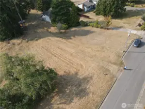 driveway access in center of photo (approximate property line-to be verified by buyer)