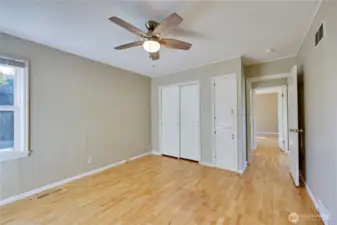 1st bedroom has built-ins alongside the closet.