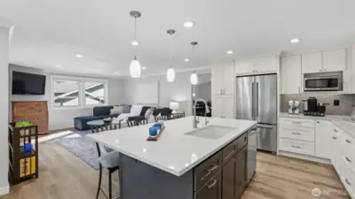 The kitchen and family room layout makes it easy to entertain or enjoy family time.