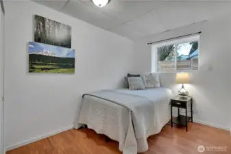 There is a good sized bedroom with a passable window...