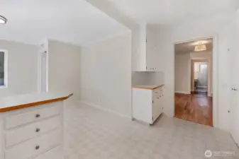 Second view of kitchen with dining room to the right and breakfast nook to the left...