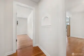 Hallway with custom niche and built ins...