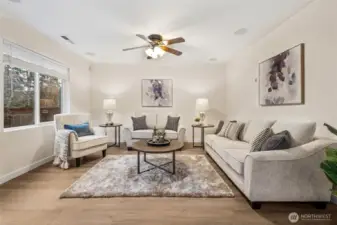 Notice the ceiling fan and the built-in speakers and the 4 inch molding and newer, vinyl windows!