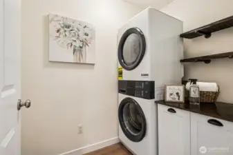 Laundry room is upstairs conveniently near the bedrooms!