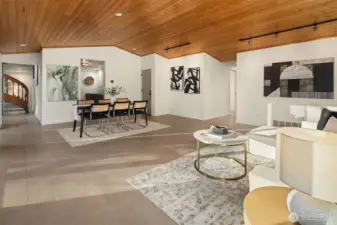 Beautiful pine ceilings adorn the family room. Large format ceramic tile flows throughout the main level.