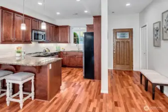 Ample space in the entry way for a bench or table. Great for tossing keys and removing shoes. Front coat closet.