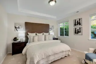 This photo is deceptive...the room is larger than it seems. There's about 10" on each side of the end tables to the wall on either side.