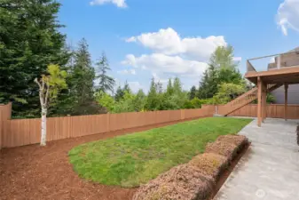 Beautifully landscaped front and back.