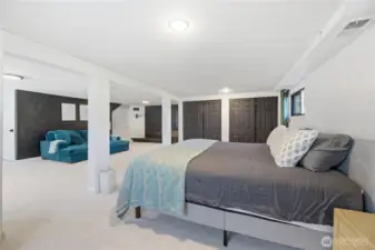 Lower-level primary bedroom with double closets