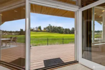 Double French doors to the expansive covered deck.