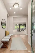 Welcoming foyer with leaded glass door.