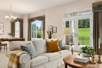 Enjoy the comfort of this elegant home with the most beautiful green view of a sweeping golf course. Custom made drapery and French doors to covered deck.