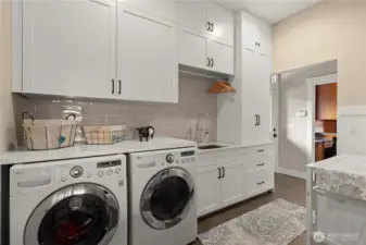 Practical amenities include a laundry/mudroom, central vac, and a whole-house generator powered by natural gas. You’ll never be in the dark!