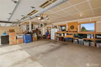 The home has an attached 4-car garage with workshop space. In addition, there is a detached garage and carport.