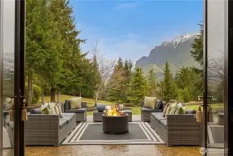 Entertain in style, no matter the season. The covered, heated patio offers seamless indoor-outdoor living, with wide French doors opening to breathtaking views. Watch the game, sip a Scotch by the fireplace, or host everything from intimate gatherings to lively celebrations—this home’s effortless flow is designed for it all. And best of all, it all comes with a spectacular view!