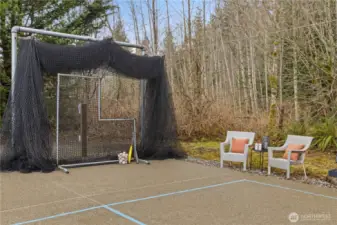 The sport court also has a professional-grade batting cage and L-screen. This is easily stowed in the detached garage in the off-season.
