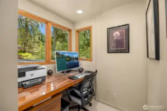 Office nook full of windows to take in the gorgeous gardens